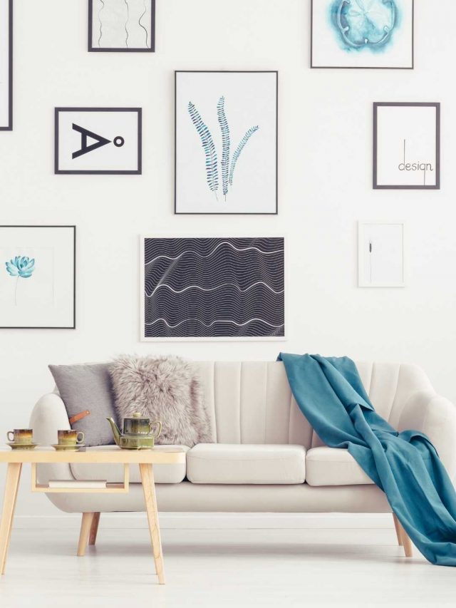cropped-sala-com-almofadas-e-manta-no-sofa-e-quadros-na-parede.jpg