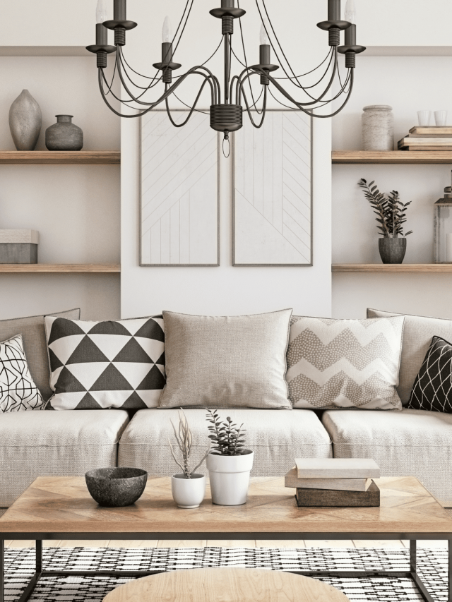 cropped-sala-de-estar-no-estilo-industrial-com-sofá-almofadas-prateleiras-mesa-de-centro-e-lustre.png