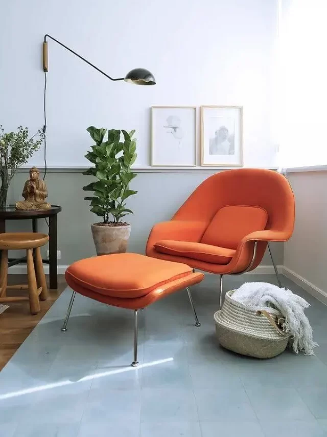 Cantinho-de-descanso-decorado-com-poltrona-confortável-para-leitura-laranja-Foto-Casa-de-Valentina