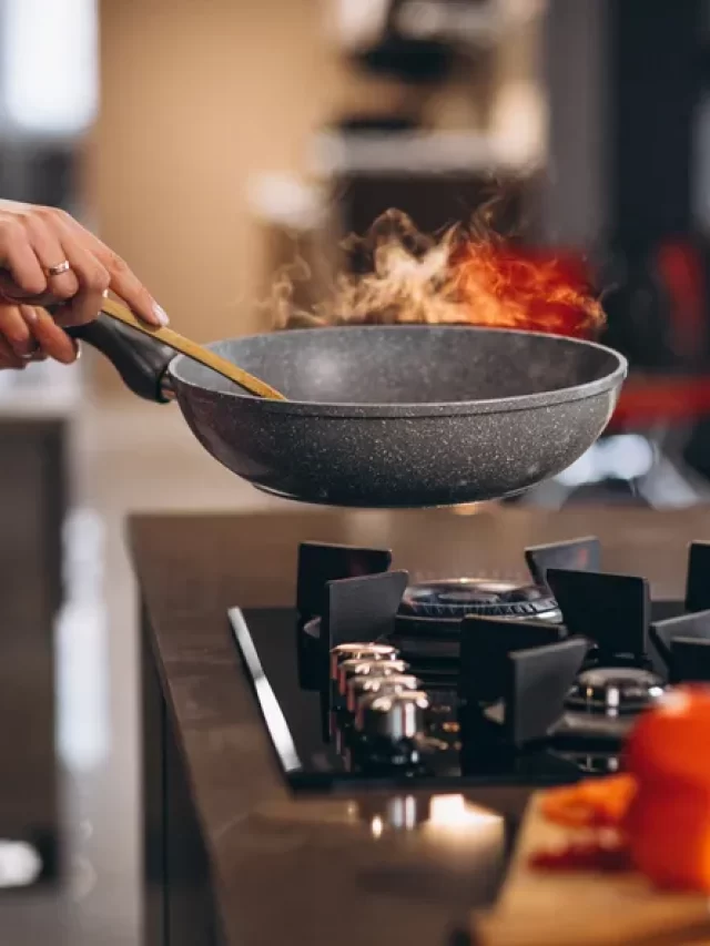 woman-chef-cooking-vegetables-in-pan