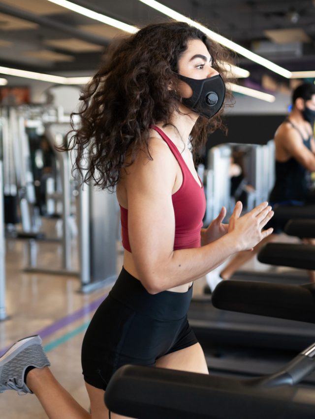 Hispanic woman doing cardio exercises at the gym